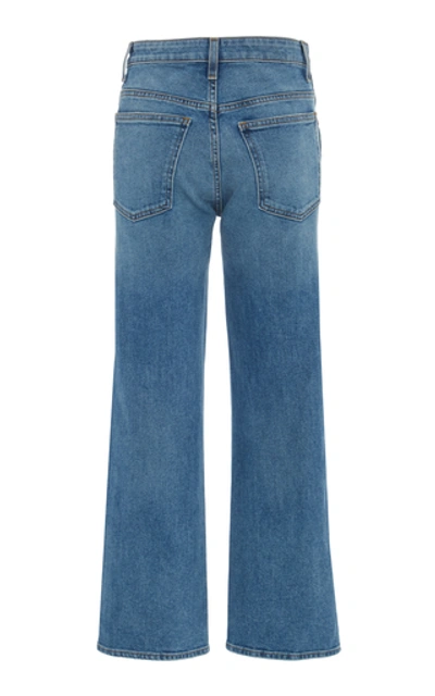 Shop Khaite Vivian Cropped Flared Jeans In Medium Wash