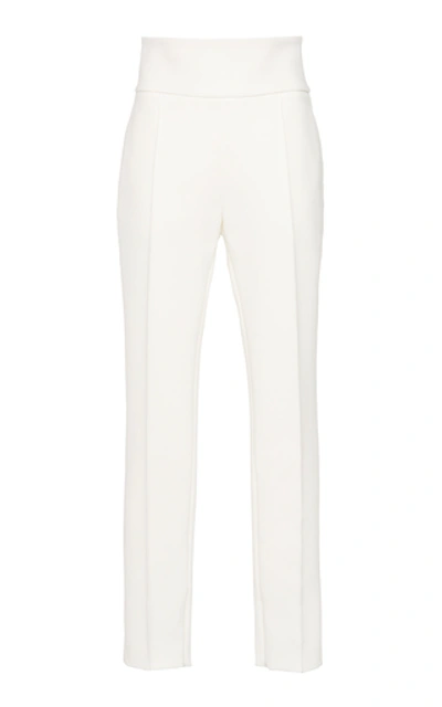 Shop Alexandre Vauthier Pleated Crepe Slim-leg Pants In White