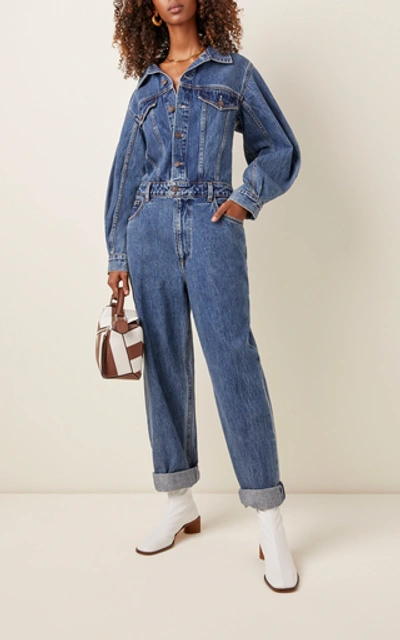 Shop Agolde Denim Jumpsuit In Medium Wash