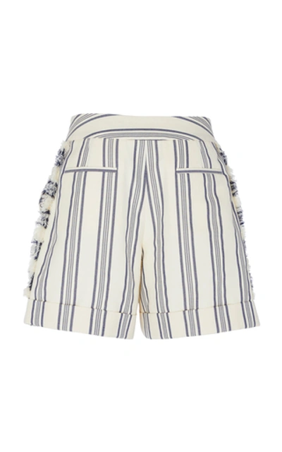 Shop Monse Fringe-trimmed Striped Cotton-blend Shorts
