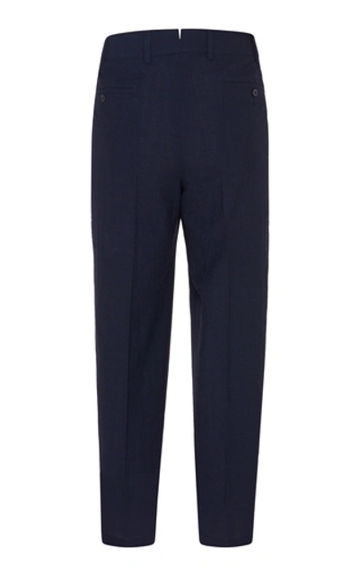 Shop The Gigi Pleated Wool Straight-leg Trousers In Navy