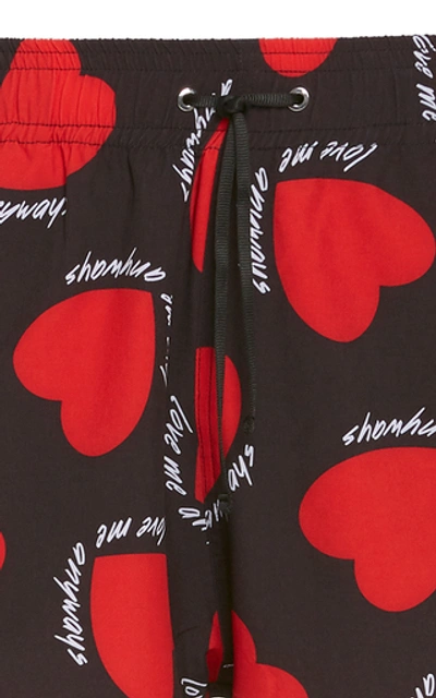 Shop Amiri Hearts Printed Swim Shorts In Black