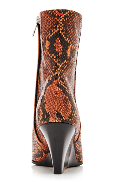 Shop Aeyde Lena Snake-print Leather Wedge Boots In Orange