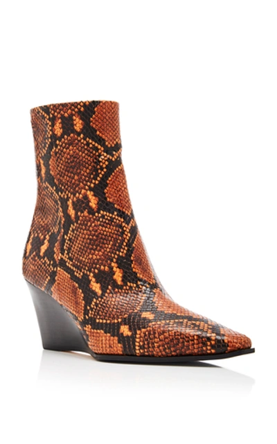 Shop Aeyde Lena Snake-print Leather Wedge Boots In Orange