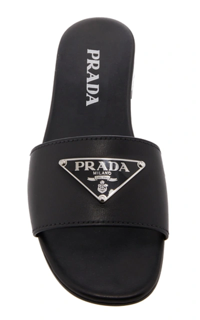 Shop Prada Appliquéd Leather Slides In Black