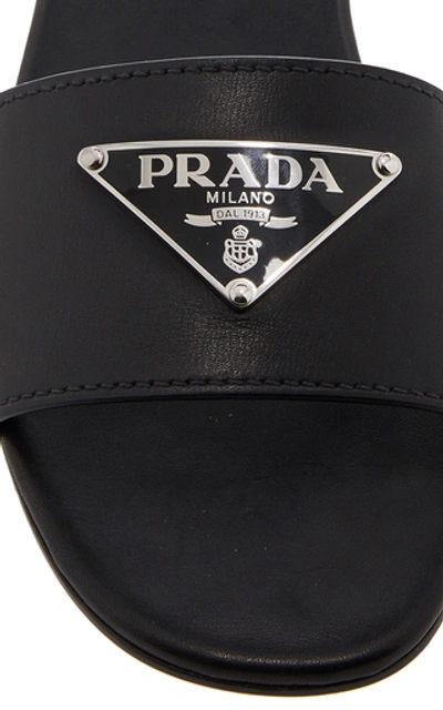 Shop Prada Appliquéd Leather Slides In Black