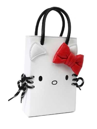 Shop Balenciaga Hello Kitty Phone Holder In White