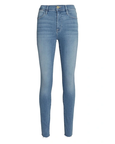 Shop Frame Le High Rise Skinny Jeans In Denim