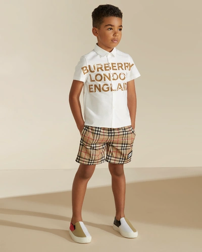 Shop Burberry Boy's Kameron Check Swim Trunks In Beige