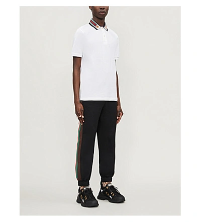 Shop Gucci Tiger-embroidered Cotton-pique Polo Shirt In White