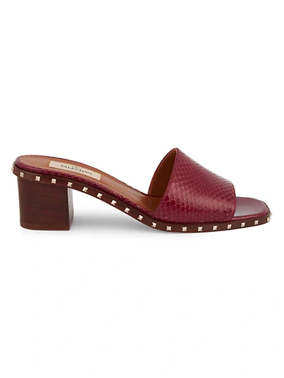 Shop Valentino Rockstud Patent Leather Slides In Red