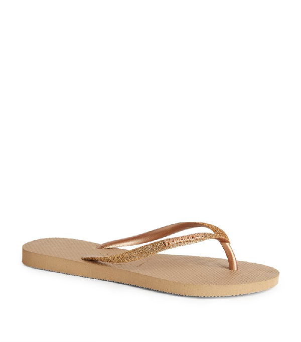 gold glitter flip flops