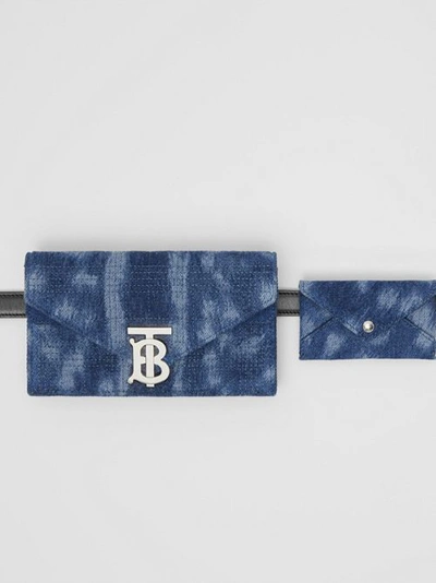 Shop Burberry Belted Quilted Denim Tb Envelope Clutch In Denim Blue