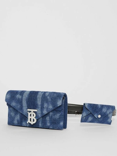 Shop Burberry Belted Quilted Denim Tb Envelope Clutch In Denim Blue