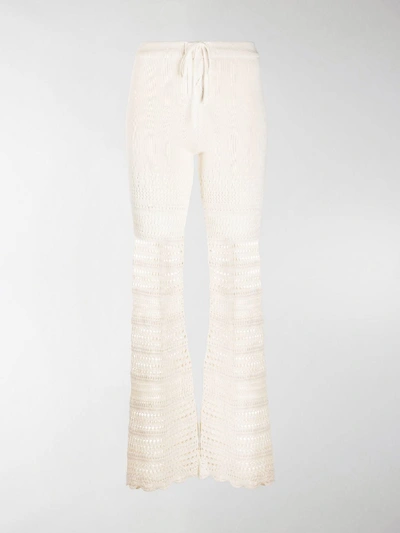 Shop Amiri Crochet-knit Flared Trousers In Neutrals