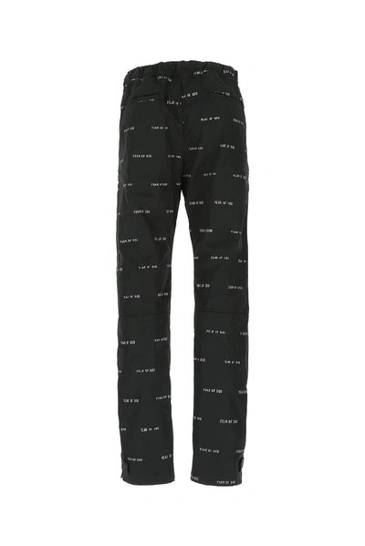 Shop Fear Of God Logo Drawstring Pants In Black