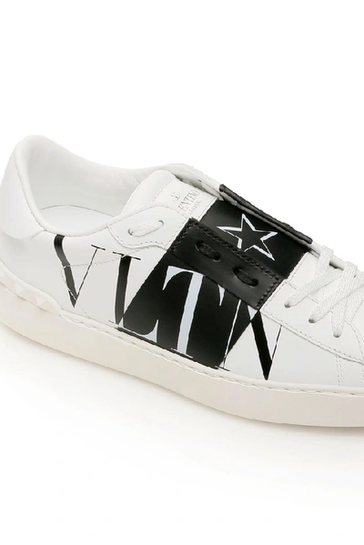Shop Valentino Vltn Low Top Sneakers In White