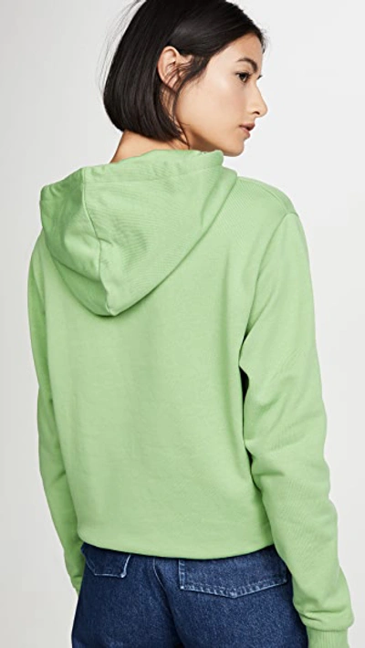 Shop Holzweiler Hang On Sweatshirt In Green With White Hanger