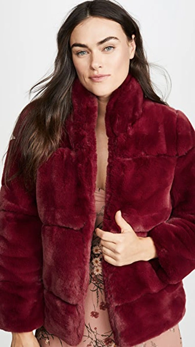 Shop Apparis Sarah Faux Fur Jacket In Ruby Red