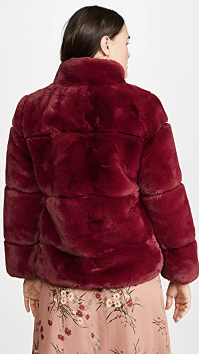 Shop Apparis Sarah Faux Fur Jacket In Ruby Red
