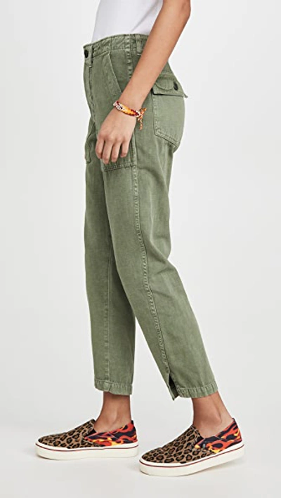 Shop Amo Army Twist Pants In Army Green