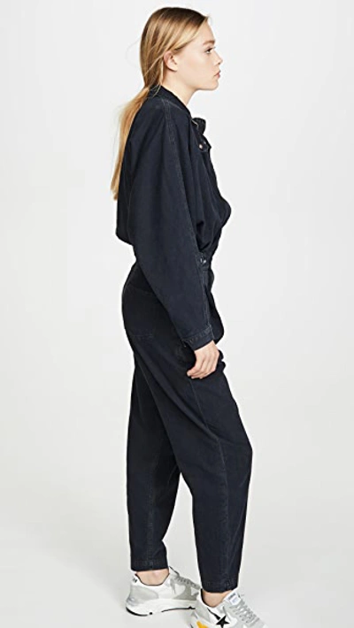 Shop Agolde Ina High Collar Zip Jumpsuit In Outcast