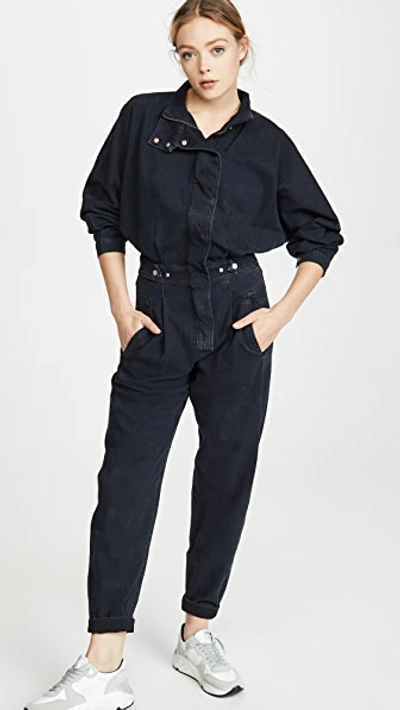 Shop Agolde Ina High Collar Zip Jumpsuit In Outcast