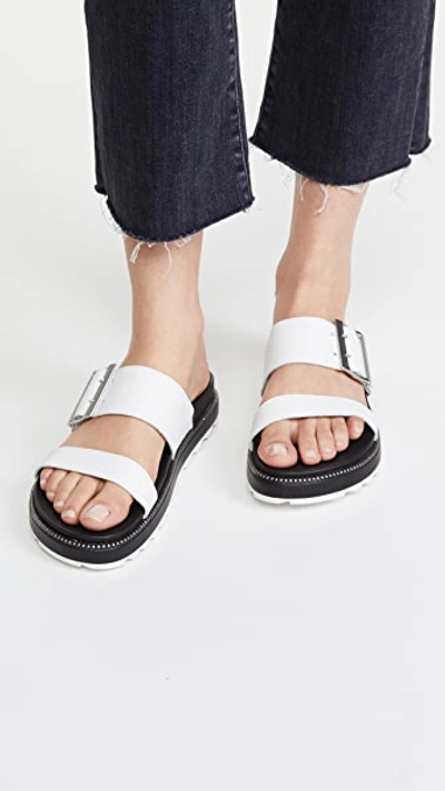 Shop Sorel Roaming Buckle Slides In Sea Salt