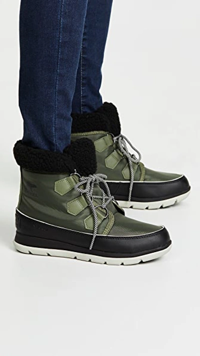 Shop Sorel Explorer Carnival Boots In Hiker Green/black