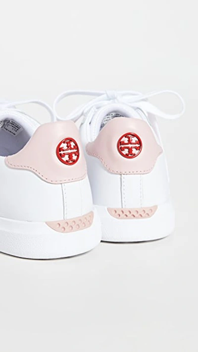 Shop Tory Burch Howell T-saddle Court Sneakers In Titanium White/sport Lipstick