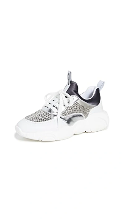 Shop Moschino Stone Embellished Sneakers In Grey/white/silver/grey