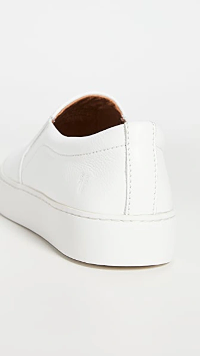 Shop Frye Lena Slip On Sneakers In White