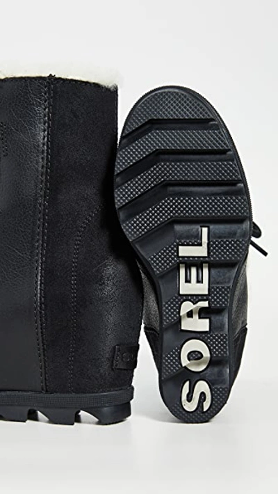Shop Sorel Joan Wedge Shearling Boots In Black