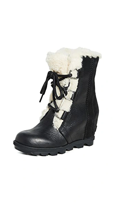 Shop Sorel Joan Wedge Shearling Boots In Black