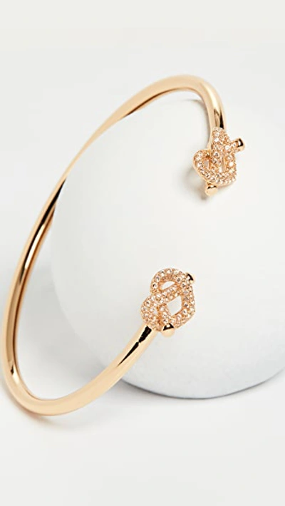 Shop Kate Spade Loves Me Knot Pave Flex Cuff In Clear/gold