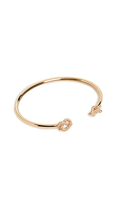 Shop Kate Spade Loves Me Knot Pave Flex Cuff In Clear/gold