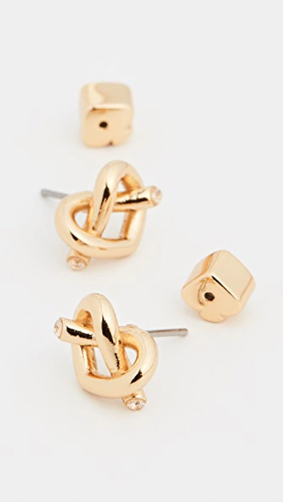 Shop Kate Spade Love Me Knot Stud Earrings In Gold