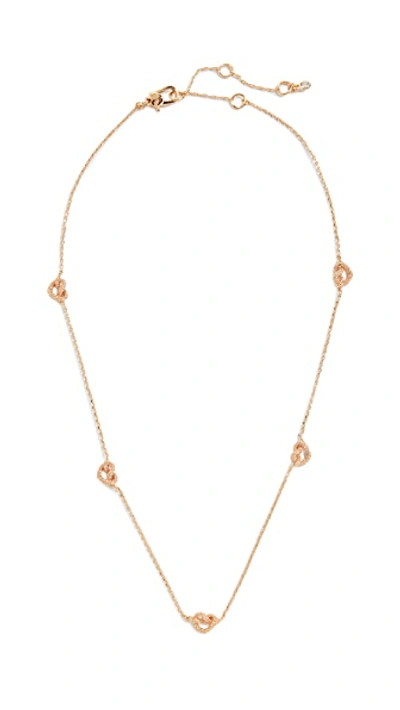 Shop Kate Spade Loves Me Knot Pave Necklace In Clear/gold