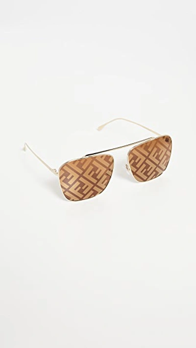 Shop Fendi Peach Logo Square Aviator Sunglasses In Gold Brown