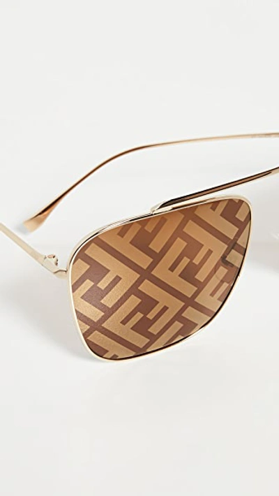 Shop Fendi Peach Logo Square Aviator Sunglasses In Gold Brown