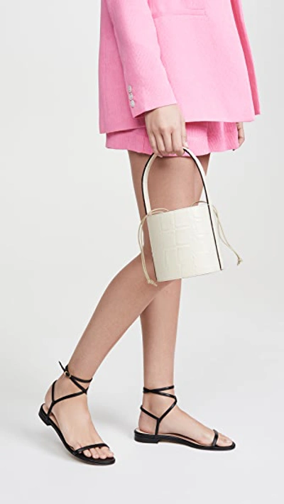 Shop Staud Mini Bissett Bag In Cream