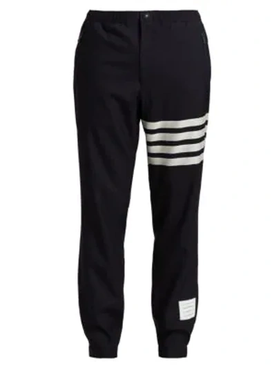 Shop Thom Browne Stripe Wool Joggers In Navy