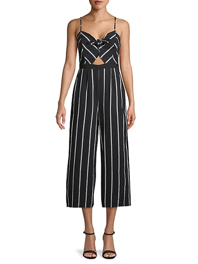 Shop Astr Striped Bow Cotton Jumpsuit In Black White Stripe