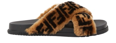 Shop Fendi Ff Fur Sandals In Tabacco