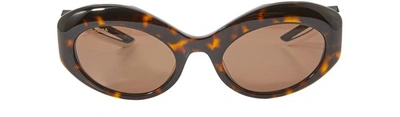 Shop Balenciaga Hybrid Oval Sun Glasses In 2220
