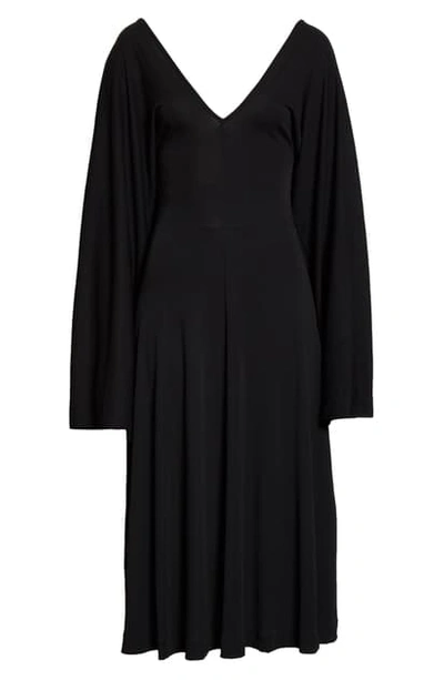 Shop Totême Bolbec Long Bell Sleeve Midi Dress In Black
