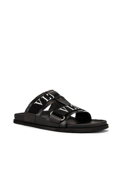 Shop Valentino Vltn Sandal In Black & White