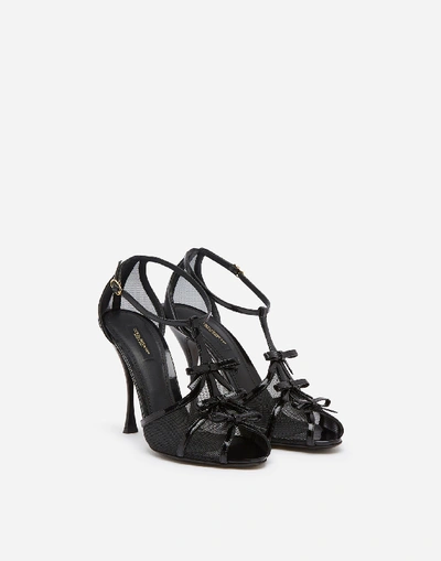 Shop Dolce & Gabbana Polished Calfskin And Mesh Sandals With Small Bows In Black