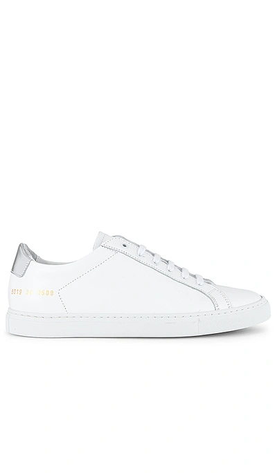 Shop Common Projects Retro Low Sneaker In White & Silver
