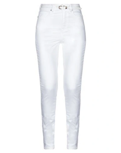 Shop Guess Pants In White
